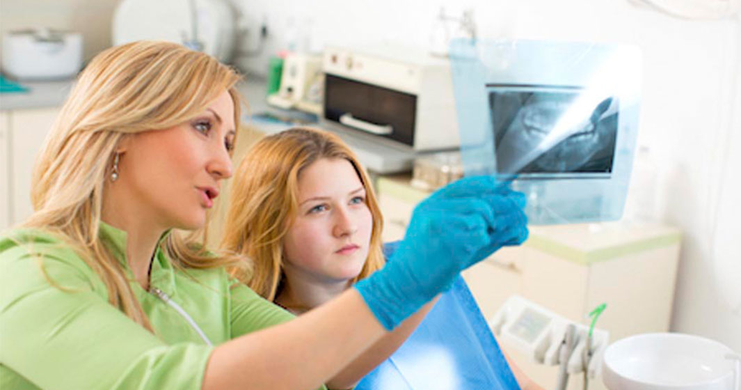 young girl having getting dental X-rays during her visit to Bishop Arts Kids Pediatric Dentistry in Dallas, TX